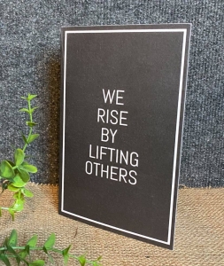 We Rise By Lifting Others